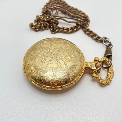 LOT 123: Pair of Gold Tone Pocket Watches with Chains (Unitron and Xanadu)