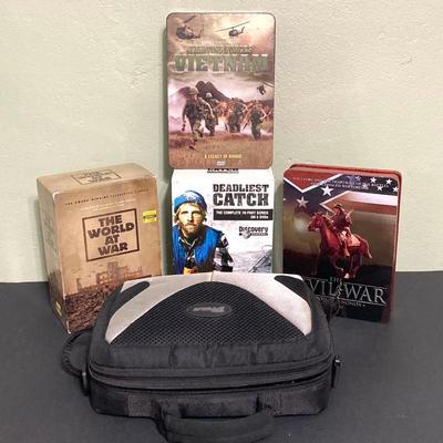 LOT 128: Mintek Portable DVD Player with Collection of DVDs
