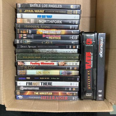 LOT 128: Mintek Portable DVD Player with Collection of DVDs