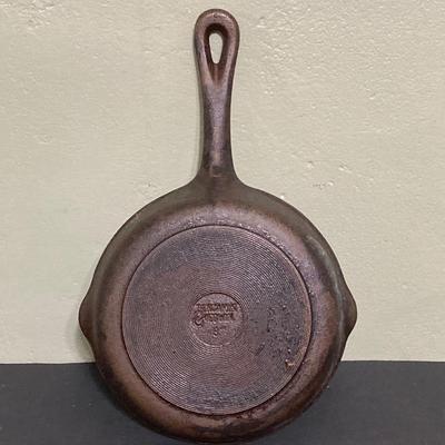 LOT 130: Vintage Cast Iron Cookware (Lodge, Benjamin Medwin and More) / Trivet and Tall Glass Mason Jar