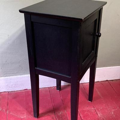 LOT 131: Painted Black Storage Cabinet and New Old Stock Ecoleben Black Side Table in Original Box
