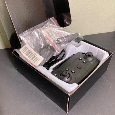 LOT 132: Large Collection of RC / Drone Equipment - Parts, Controllers, Accessories and More