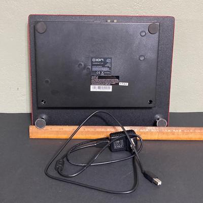 LOT 134: Ion Compact LP Turntable / Player in Original Box with Collection of 45 Records