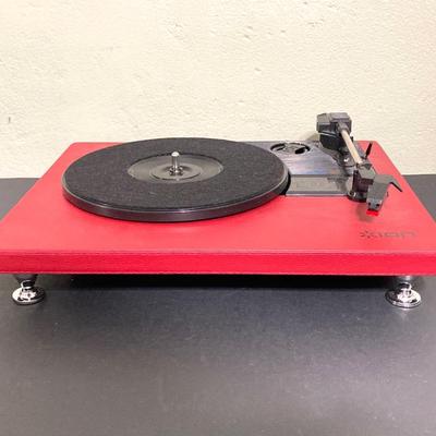 LOT 134: Ion Compact LP Turntable / Player in Original Box with Collection of 45 Records