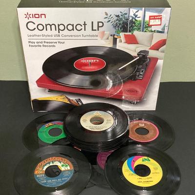 LOT 134: Ion Compact LP Turntable / Player in Original Box with Collection of 45 Records