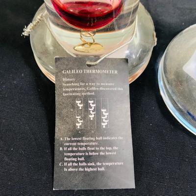 LOT 190: Wilford Blown Glass Oil Lamp and a Set of Two (2) Galileo Thermometers