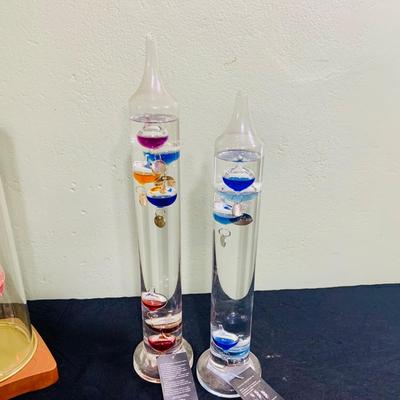LOT 190: Wilford Blown Glass Oil Lamp and a Set of Two (2) Galileo Thermometers