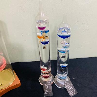 LOT 190: Wilford Blown Glass Oil Lamp and a Set of Two (2) Galileo Thermometers
