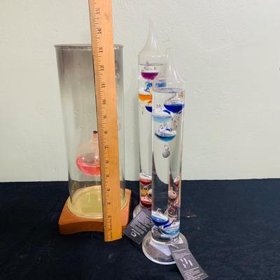 LOT 190: Wilford Blown Glass Oil Lamp and a Set of Two (2) Galileo Thermometers