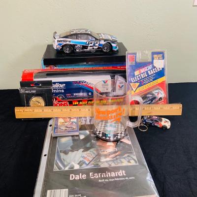 LOT 191: NASCAR Collection Including Lionel Racing Die Cast Car, Racing Champions Truck, NASCAR 75th Anniversary Coin, Earnhardt Singed...