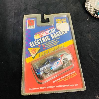 LOT 191: NASCAR Collection Including Lionel Racing Die Cast Car, Racing Champions Truck, NASCAR 75th Anniversary Coin, Earnhardt Singed...
