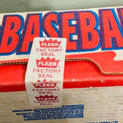 LOT 194: Baseball Collection - Opened and Unopened Boxes of Baseball Cards, Phillies Mini Bat and 2008 World Series Glass