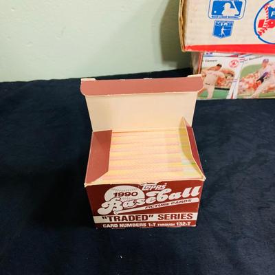 LOT 194: Baseball Collection - Opened and Unopened Boxes of Baseball Cards, Phillies Mini Bat and 2008 World Series Glass
