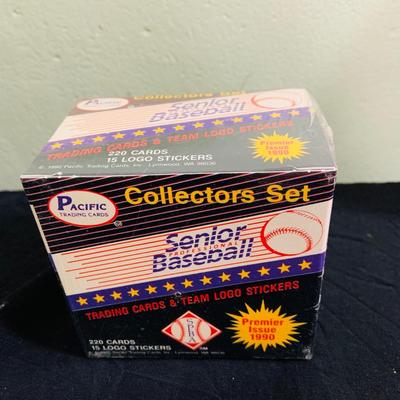 LOT 194: Baseball Collection - Opened and Unopened Boxes of Baseball Cards, Phillies Mini Bat and 2008 World Series Glass