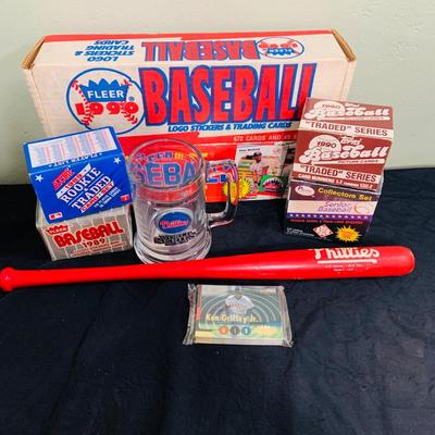 LOT 194: Baseball Collection - Opened and Unopened Boxes of Baseball Cards, Phillies Mini Bat and 2008 World Series Glass