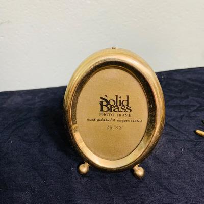 LOT 195: Brass Duck Head Book Ends, Brass Cricket and Mini Picture Frame