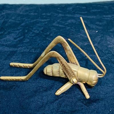 LOT 195: Brass Duck Head Book Ends, Brass Cricket and Mini Picture Frame