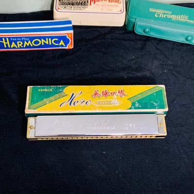LOT 197: Collection of Vintage Harmonicas by Lark, Horner, Schylling and Hero
