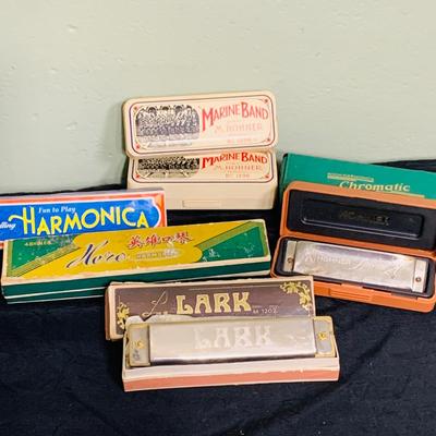 LOT 197: Collection of Vintage Harmonicas by Lark, Horner, Schylling and Hero