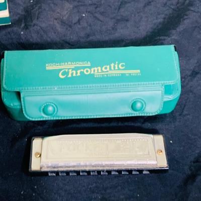 LOT 197: Collection of Vintage Harmonicas by Lark, Horner, Schylling and Hero