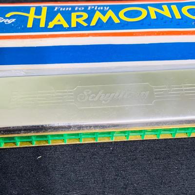 LOT 197: Collection of Vintage Harmonicas by Lark, Horner, Schylling and Hero