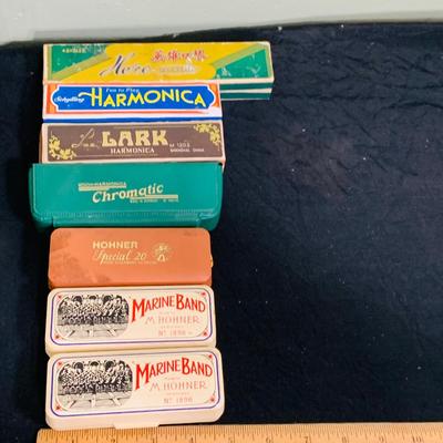LOT 197: Collection of Vintage Harmonicas by Lark, Horner, Schylling and Hero