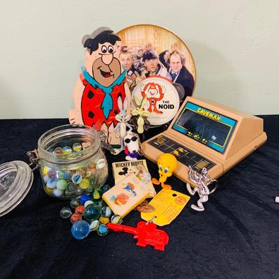 LO 207: Collection of Vintage Toys, Game and Marbles Featuring Tandy Caveman Electronic Table Top Game, Fred Flintstone Wooden Puzzle,...
