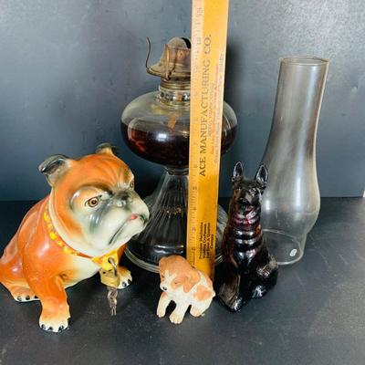 LOT 213: Vintage Bull Dog 2 Piece Porcelain Bank with Lock and Key Made in Japan, Homco and Avon Dogs and a Oil Lamp