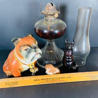 LOT 213: Vintage Bull Dog 2 Piece Porcelain Bank with Lock and Key Made in Japan, Homco and Avon Dogs and a Oil Lamp