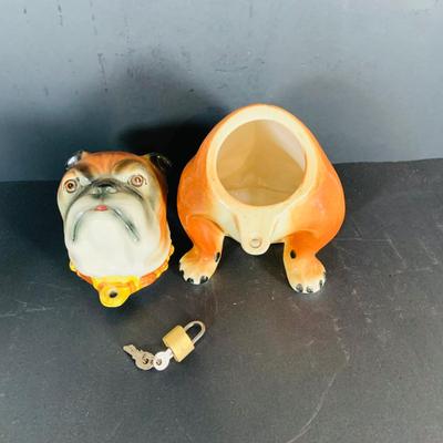 LOT 213: Vintage Bull Dog 2 Piece Porcelain Bank with Lock and Key Made in Japan, Homco and Avon Dogs and a Oil Lamp