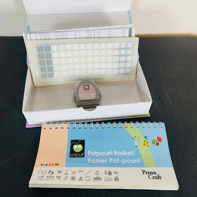 LOT 215: Cricut Expression Machine for Cutting Vinyl Includes Rolls of Vinyl and Expansion Package and More. Cord is Missing