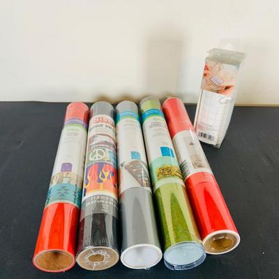 LOT 215: Cricut Expression Machine for Cutting Vinyl Includes Rolls of Vinyl and Expansion Package and More. Cord is Missing