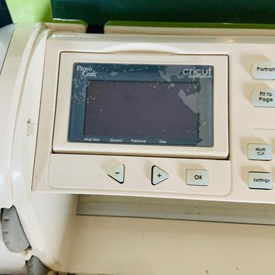 LOT 215: Cricut Expression Machine for Cutting Vinyl Includes Rolls of Vinyl and Expansion Package and More. Cord is Missing