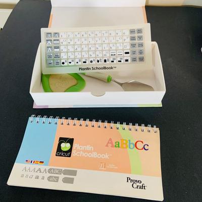 LOT 215: Cricut Expression Machine for Cutting Vinyl Includes Rolls of Vinyl and Expansion Package and More. Cord is Missing