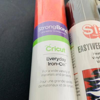 LOT 215: Cricut Expression Machine for Cutting Vinyl Includes Rolls of Vinyl and Expansion Package and More. Cord is Missing