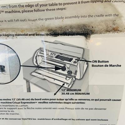 LOT 215: Cricut Expression Machine for Cutting Vinyl Includes Rolls of Vinyl and Expansion Package and More. Cord is Missing