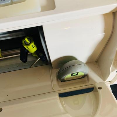 LOT 215: Cricut Expression Machine for Cutting Vinyl Includes Rolls of Vinyl and Expansion Package and More. Cord is Missing