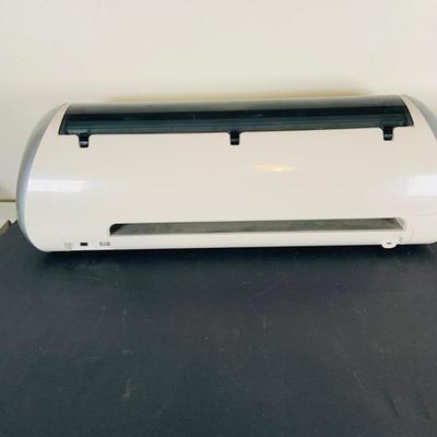 LOT 215: Cricut Expression Machine for Cutting Vinyl Includes Rolls of Vinyl and Expansion Package and More. Cord is Missing
