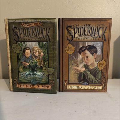 LOT 219: Books & More: Unopened Lord of the Rings Collection, The Spiderwick Chronicles Books, The Dark Rising Sequence
