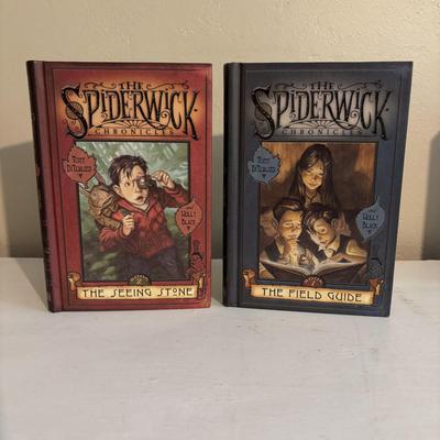 LOT 219: Books & More: Unopened Lord of the Rings Collection, The Spiderwick Chronicles Books, The Dark Rising Sequence