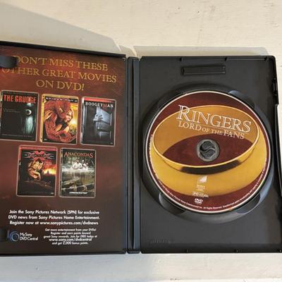LOT 219: Books & More: Unopened Lord of the Rings Collection, The Spiderwick Chronicles Books, The Dark Rising Sequence