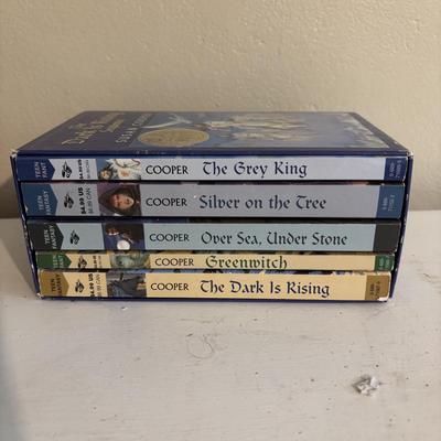 LOT 219: Books & More: Unopened Lord of the Rings Collection, The Spiderwick Chronicles Books, The Dark Rising Sequence