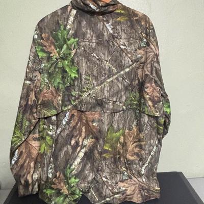 LOT 222: Mossy Oak (XL) Camo Shirt, Outers Shotgun Cleaning Kit, Marksman 4x32 Scope & Primos Trigger Stick Gen2 Jim Shockey Edition
