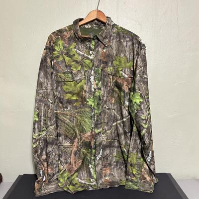 LOT 222: Mossy Oak (XL) Camo Shirt, Outers Shotgun Cleaning Kit, Marksman 4x32 Scope & Primos Trigger Stick Gen2 Jim Shockey Edition