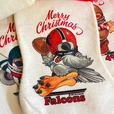 LOT 245: Vintage Merry Christmas NFL Teams Stocking Collection (21)