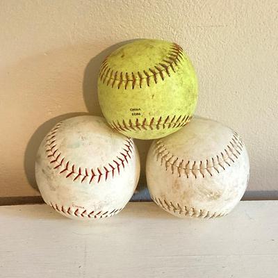 LOT 246: Pair of Softball / Baseball Leather Gloves (Winfield Diamond Pro and Rawlings) with Three Softballs