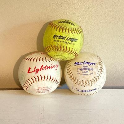LOT 246: Pair of Softball / Baseball Leather Gloves (Winfield Diamond Pro and Rawlings) with Three Softballs