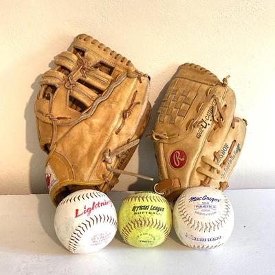 LOT 246: Pair of Softball / Baseball Leather Gloves (Winfield Diamond Pro and Rawlings) with Three Softballs