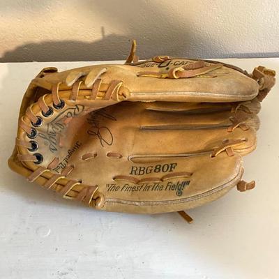 LOT 246: Pair of Softball / Baseball Leather Gloves (Winfield Diamond Pro and Rawlings) with Three Softballs
