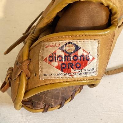 LOT 246: Pair of Softball / Baseball Leather Gloves (Winfield Diamond Pro and Rawlings) with Three Softballs